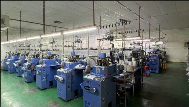 Foshan Yumian Weaving Co., Ltd. línea de producción del fabricante